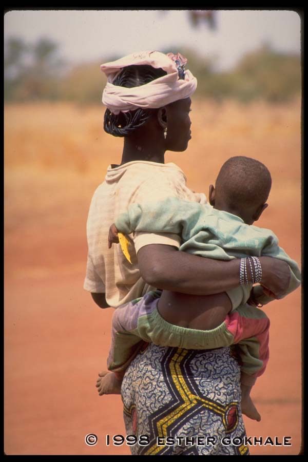 Burkina Faso woman carrying child
